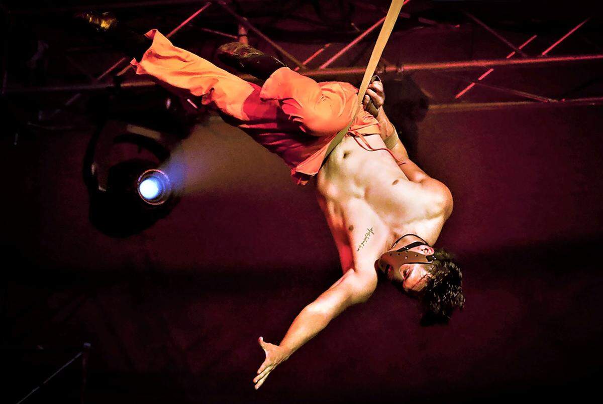 Aerial performer Moises Almaraz as a serial killer character during Paranormal Cirque.