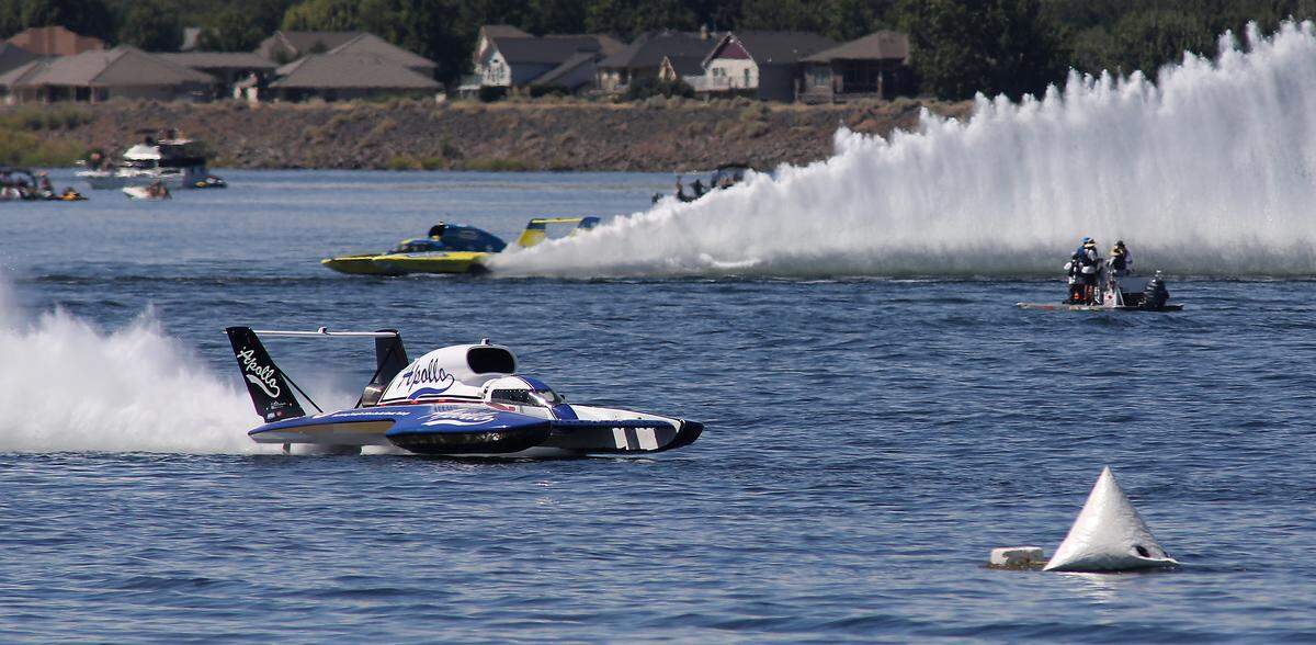 Dave Villwock in the U-27 Miss Apollo unlimited hydroplane claims victory in front of Jamie Nilson in the U-11 Miss Flav-R-Pac during Heat 4A Sunday on the Columbia River.