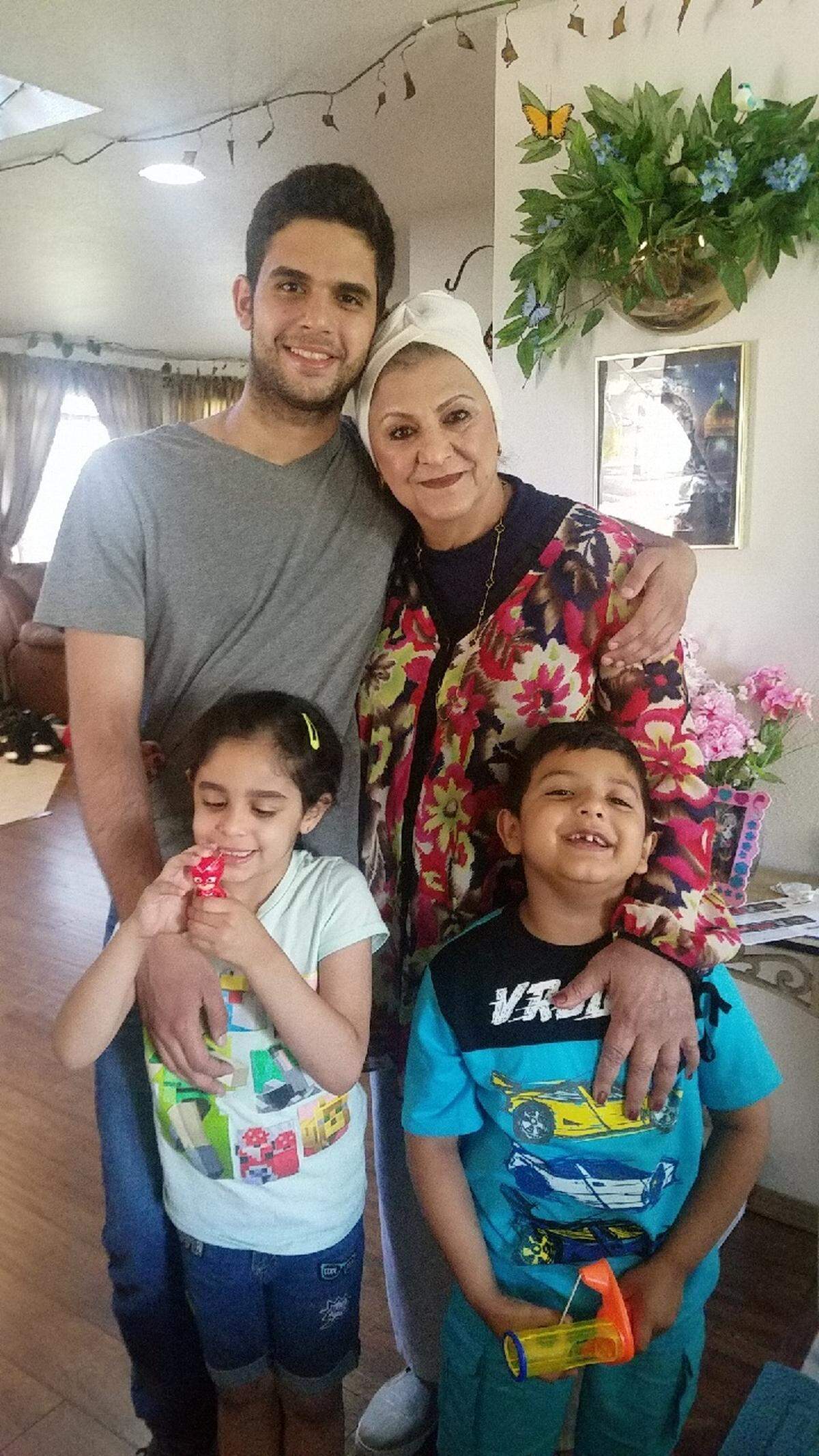Razkya Al Salami with her three grandchildren: Aseel, the oldest; Laya, bottom left; and Gabriel, bottom right.