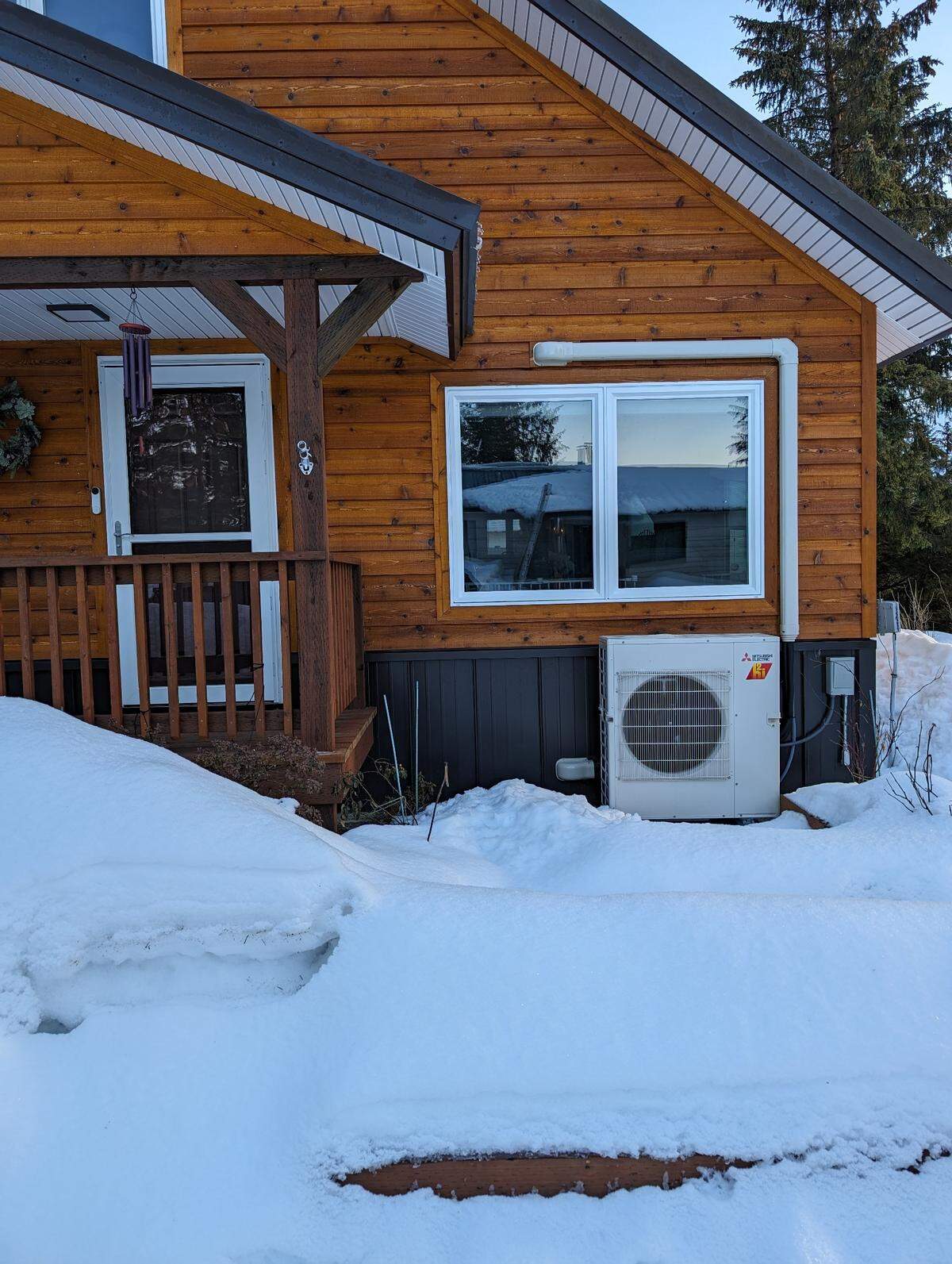 Cold climate heat pump: Researchers at PNNL collected and analyzed data from prototypes of cold climate heat pumps installed in homes like this one in Alaska to determine if they would operate efficiently in real-world conditions.