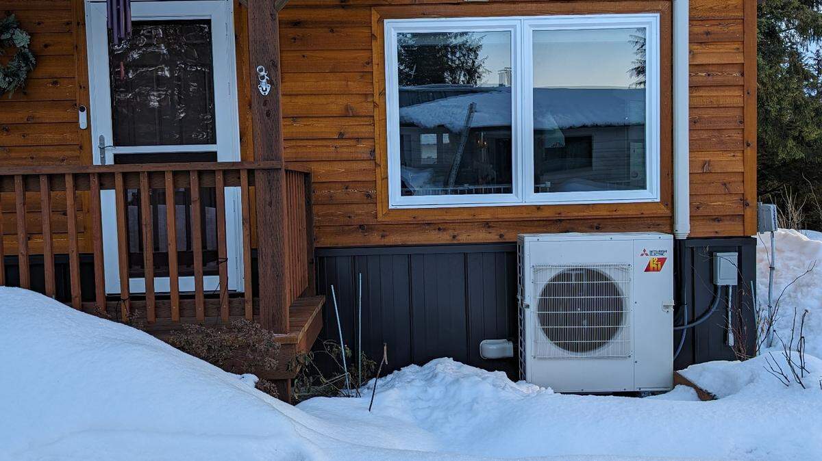 Cold climate heat pump: Researchers at PNNL collected and analyzed data from prototypes of cold climate heat pumps installed in homes like this one in Alaska to determine if they would operate efficiently in real-world conditions.