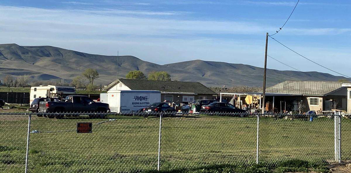 Law enforcement and code enforcement have been called out to an Old Inland Empire Highway home dozens of times over the past four years for aggressive dogs, suspected puppy mills, junk, debris and stolen cars and trailers.