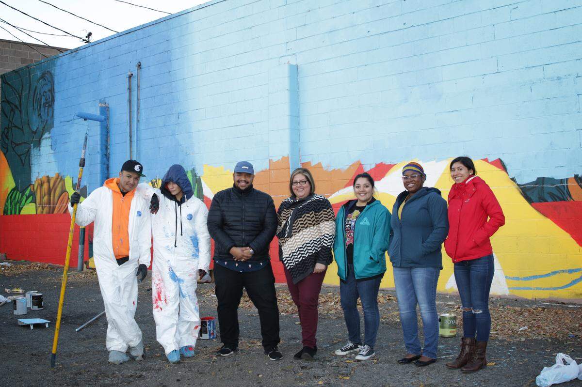Members of Team Hope, from left to right, Israel Badder & Rose, of Badder Ink in Kennewick; Poet Jordan Chaney, Pasco City Councilwoman Blanche Barajas, Nisha McSwane-Franco, Daisy Vargas, Glendy Ibarra.