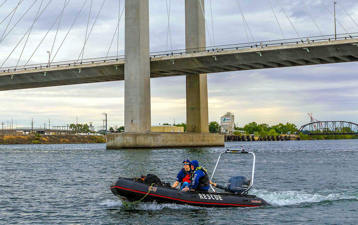 Columbia Basin Dive Rescue searched the Columbia River from the power transmission line west of the cable bridge downstream toward the railroad bridge Sunday as part of the National Transportation Safety Board's ongoing investigation into last week's fatal floatplane crash.
