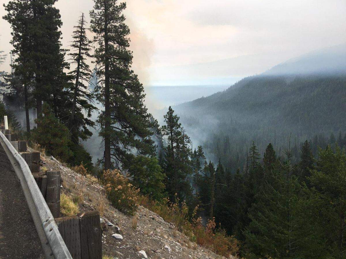 Smoke rises from the forest fire along Highway 12 near White Pass.