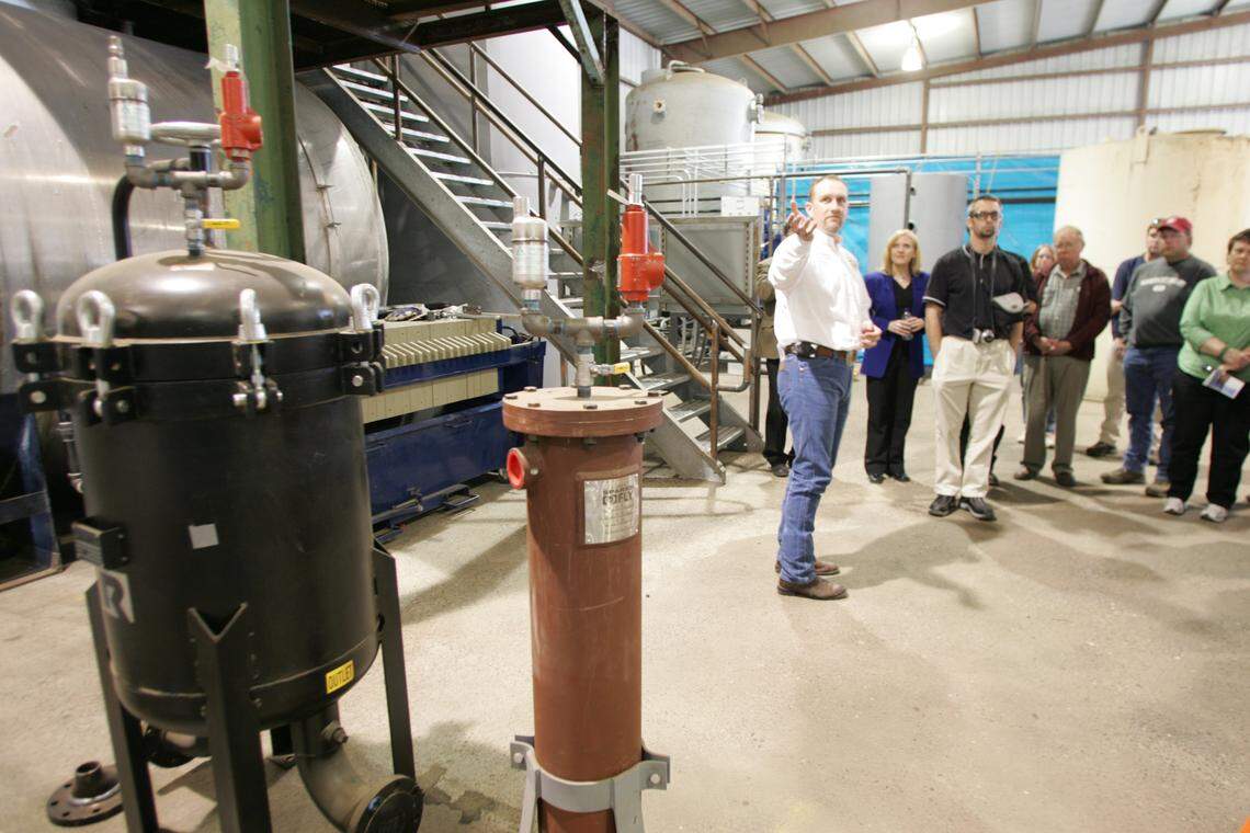 Scott C. Johnson, founder and president of the now-defunct Pasco-based Gen-X Energy Group, is serving eight years in federal prison for leading a conspiracy to bilk the government out of millions in renewable energy tax credits. He is pictured during a 2007 tour at his Burbank biodiesel facility.