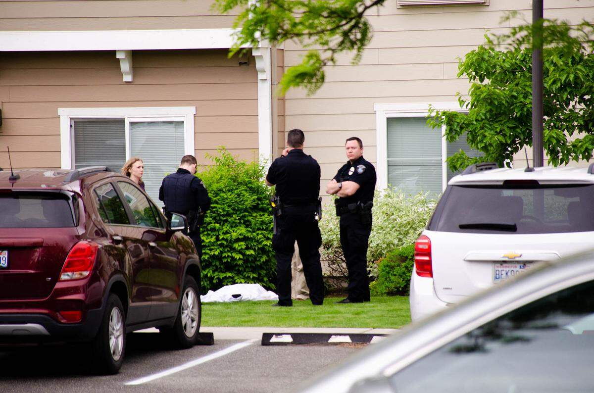Kennewick investigators were on the scene at the Parkview Estates on Sixth Avenue after a man died on the lawn.