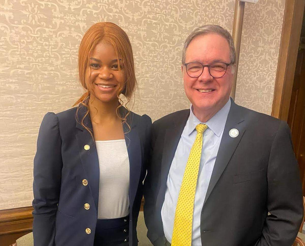 Richland High School junior Micah Fitzgerald poses for a photo with Washington Lt. Gov. Denny Heck on Monday, Jan. 30. Fitzgerald is a first-year council member on the Washington Legislative Youth Advisory Council, which has penned a bill to promote the adoption of school districti curricula that is diverse, equitable and inclusive.