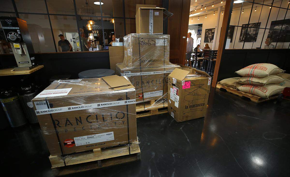 New equipment, espresso machines and coffee grinders, sit on the floor inside Rockabilly Roasting Co. is at 101 W. Kennewick Ave.