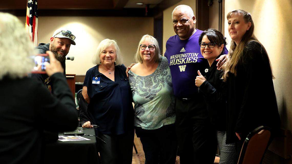 Retired Seattle Seahawks player Michael Jackson poses for a photo with Pasco Kiwanis Club members following a meeting at the Red Lion Inn in Pasco. The Pasco native spoke about his college and professional football career. He credits his success to his parents instilling in him to get good grades, to stay out of trouble and keeping focused on his goals. The 1975 Pasco High grad played college football at the University of Washington and was a linebacker for the Seattle Seahawks from 1979-1986.