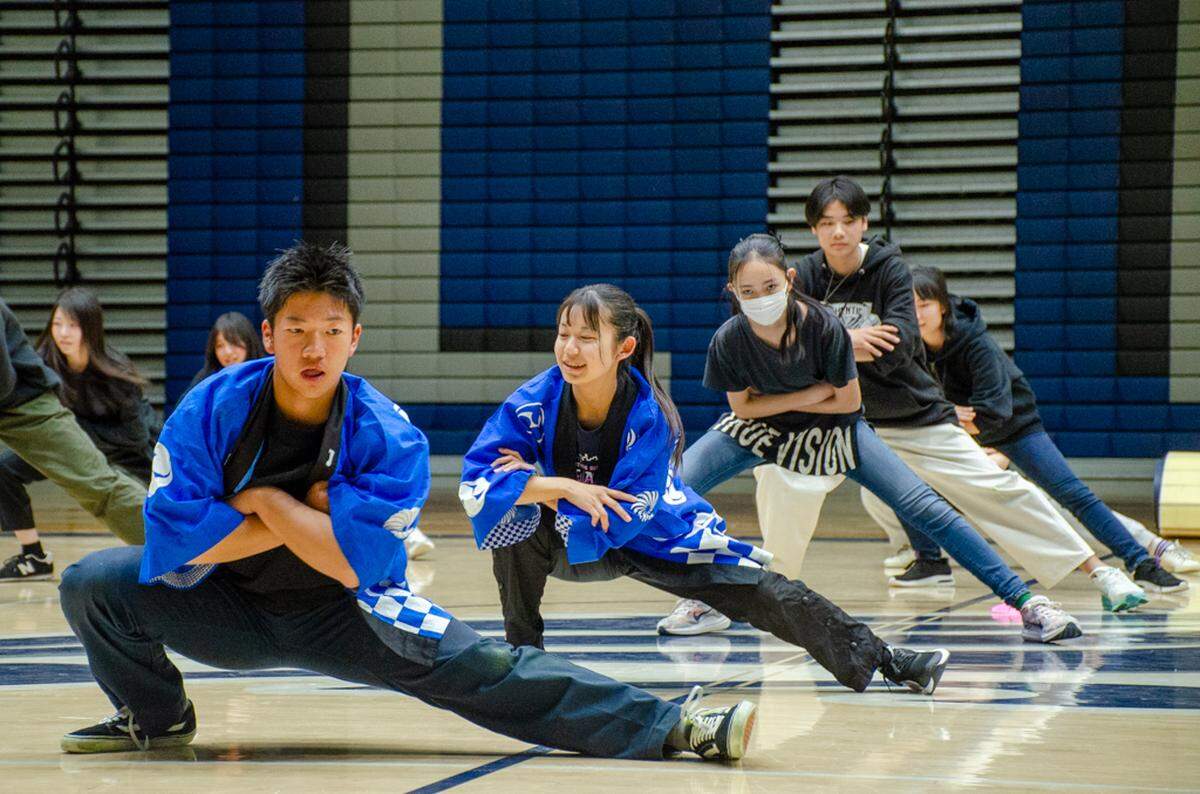 Students from the Yamate Gakuin Jr. Senior High School conduct a dance Thursday for Chiawana High School’s International Night, a vibrant celebration of culture, global connection and community.