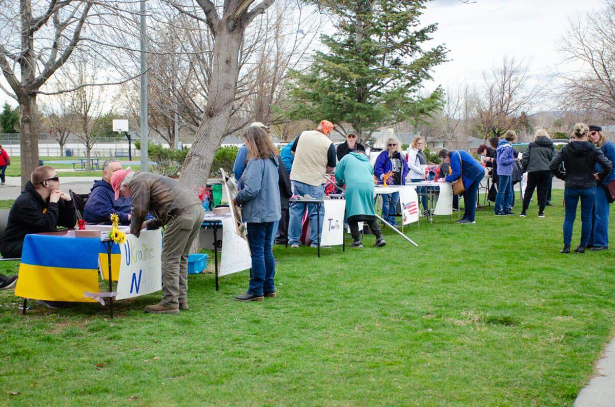 Tables were set up outside for a letter-writing campaign focused on issues such as health care, education, tariffs, LGBTQ rights, public health research funding and climate change.