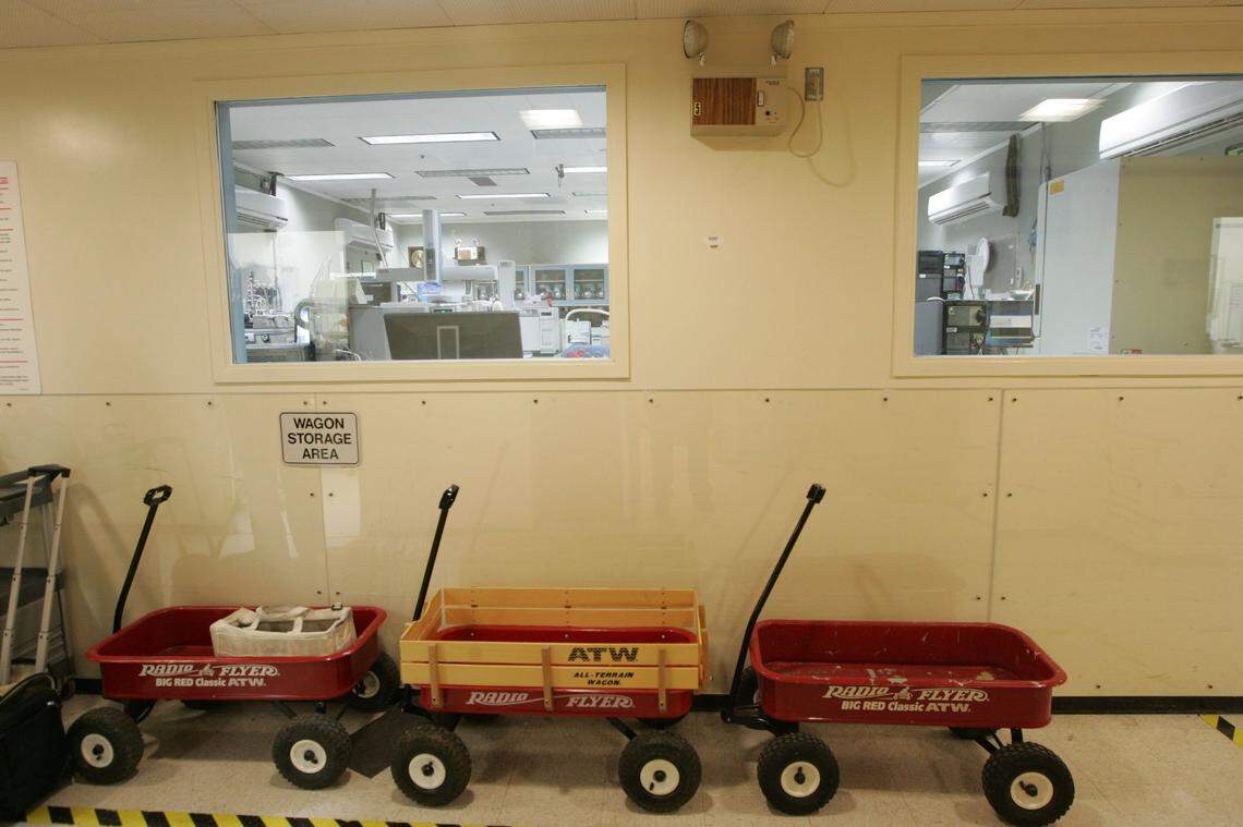 Red wagons are used to move waste samples around the 222-S Laboratory at the Hanford nuclear reservation adjoining Richland, Wash.
