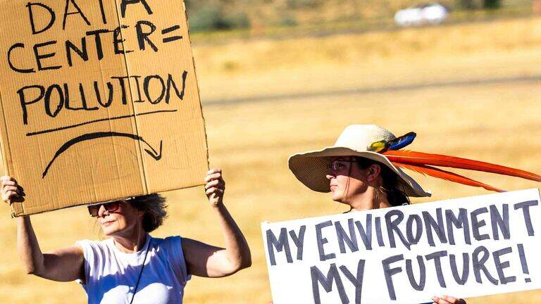 Data center protesters rally outside Amazon open house near Tri-Cities