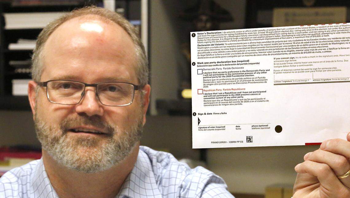Franklin County Auditor Matt Beaton holds up an example of the 2020 primary ballot envelope requiring voters to mark a party declaration for their vote to be counted. The requirement hasn’t sat well with hundreds voters and has put their votes at risk. Watch a video at: tricityherald.com/videos