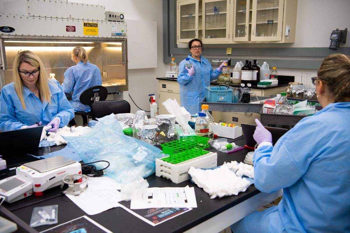 PNNL researchers prepare soils as part of a NASA-funded experiment called DynaMoS, or Dynamics of Microbiomes in Space.