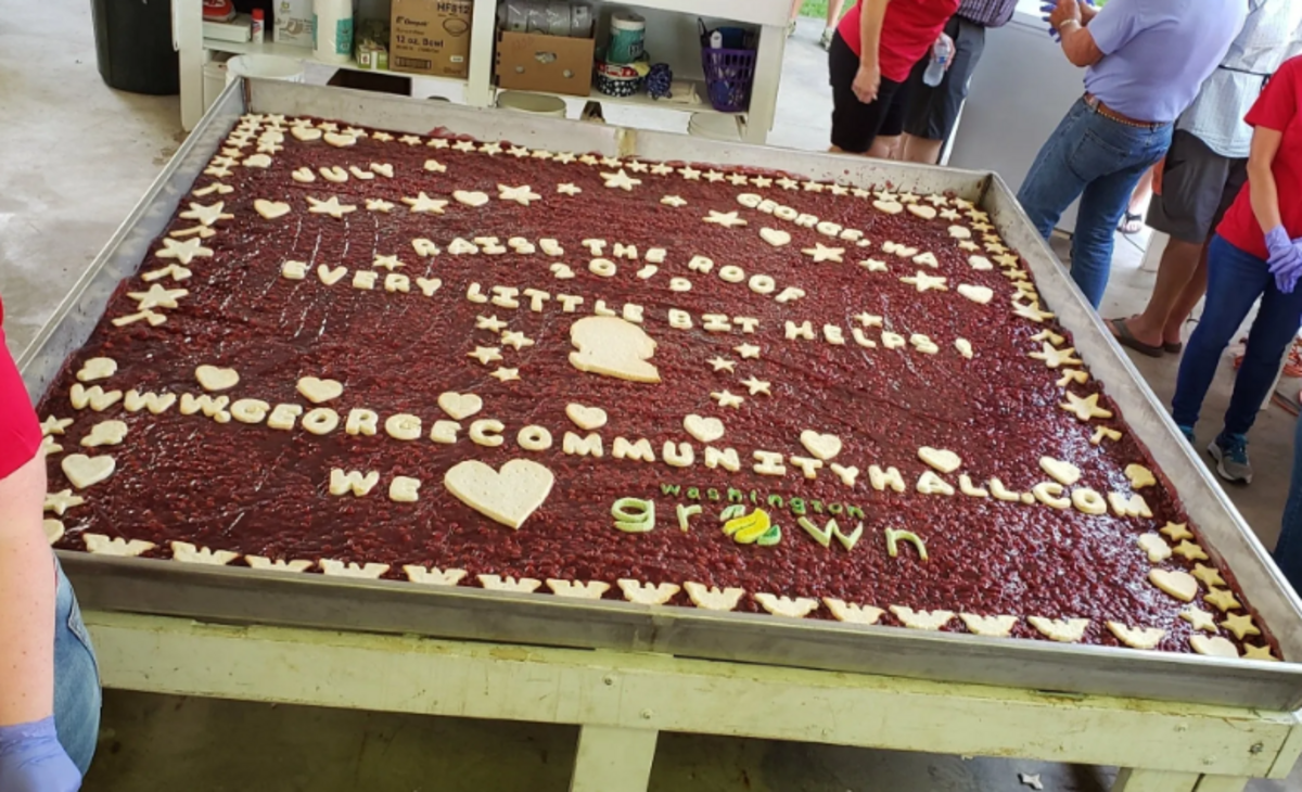 Shot of the 2019 8-foot by 8-foot cherry pie baked at the George, WA annual Fourth of July Celebration by the Georgettes.