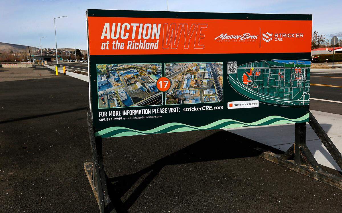 An auction of 18 parcels, including Island View Grocery and Sage Port Grill, could set the stage for future apartments and commerce in the Richland Wye.