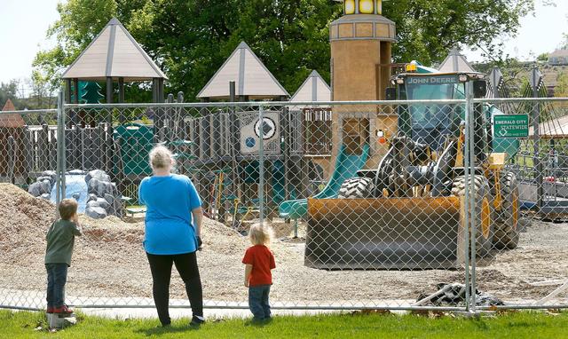 Kerian Burris of Kennewick and grandsons Silas Richards, 4, and Rylen Richards, 3, found the Toyota Playground of Dreams still closed Friday in Columbia Park for a $1 million rebuilding project. The popular Kennewick attraction is to be finished in time for Memorial Day weekend. A groundbreaking is planned May 8 to release more details. Watch a video at: tricityherald.com/video