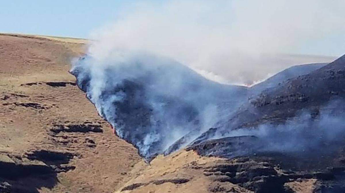 A wildfire that started June 4, 2018, burns near the Columbia River in Benton County. The state Fire Marshal's Office committed state aircraft to help with the Les Blair Fire after a Benton County fire chief asked for assistance.