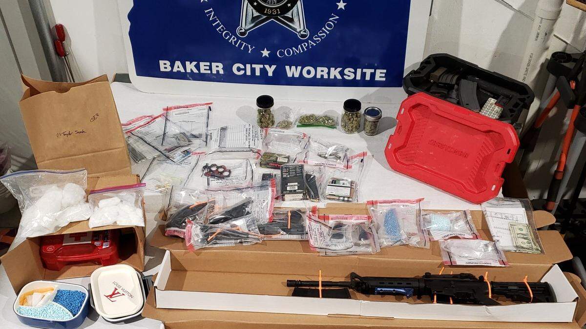 A Richland man was arrested and police found pounds of meth, thousands of pills and several guns in his car.