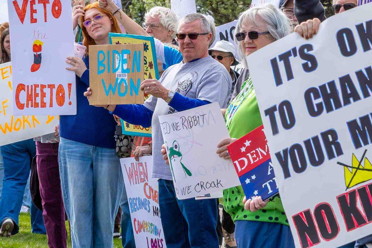 Demonstrators attend Saturday’s “No Kings” protest in Kennewick, protesting the Trump Administration and its military escalation in Iran.