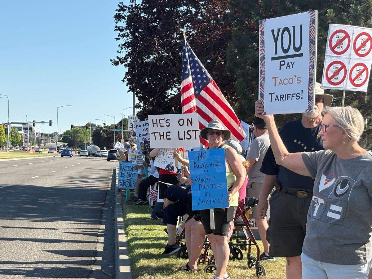 Some signs at the “Good Trouble Lives On” protest in Kennewick, Wash. referenced the Epstein files and President Donald Trump’s reported involvement.