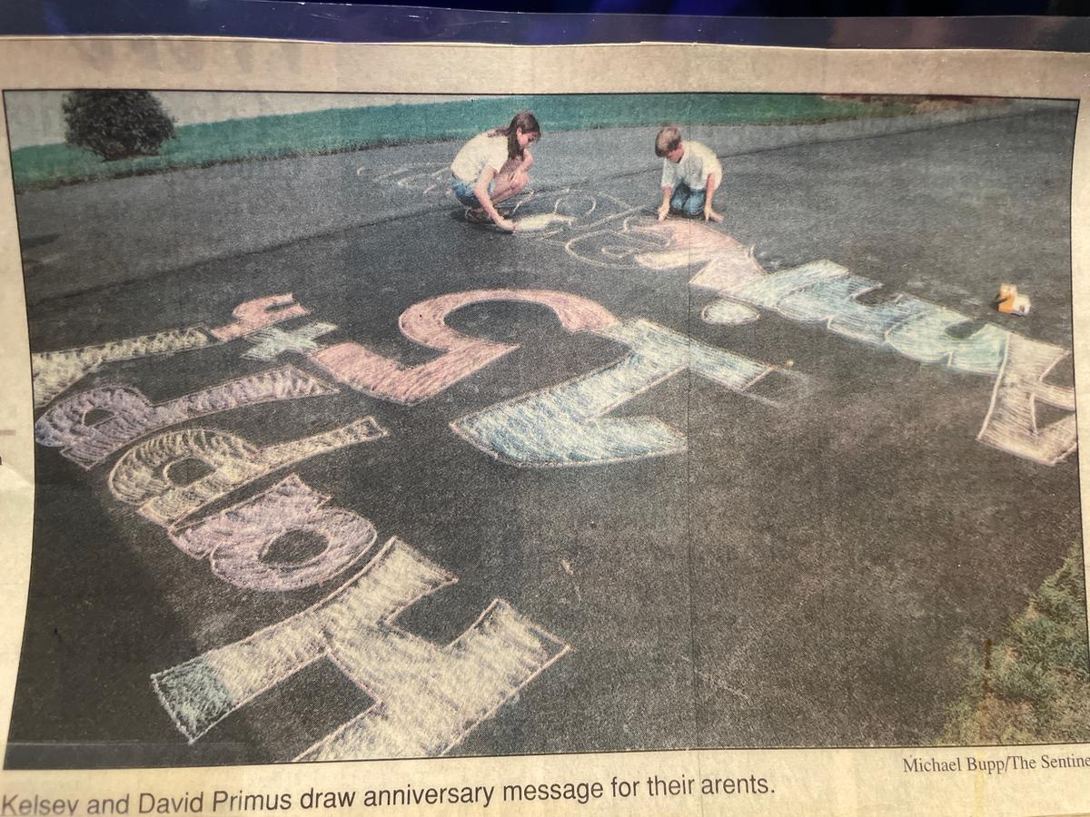 A clip from The Sentinel newspaper in Cumberland County, PA, shows an 11-year-old David Primus and his 14-year-old sister, Kelsey, drawing a 15th wedding anniversary message for their parents in North Middleton Township. The couple celebrated their 40th this past Saturday at their new home in Richland, WA.