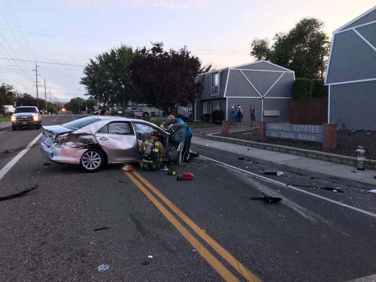 Emergency crews help at the crash in September 2019 at Fourth Avenue and Morain Street in Kennewick.
