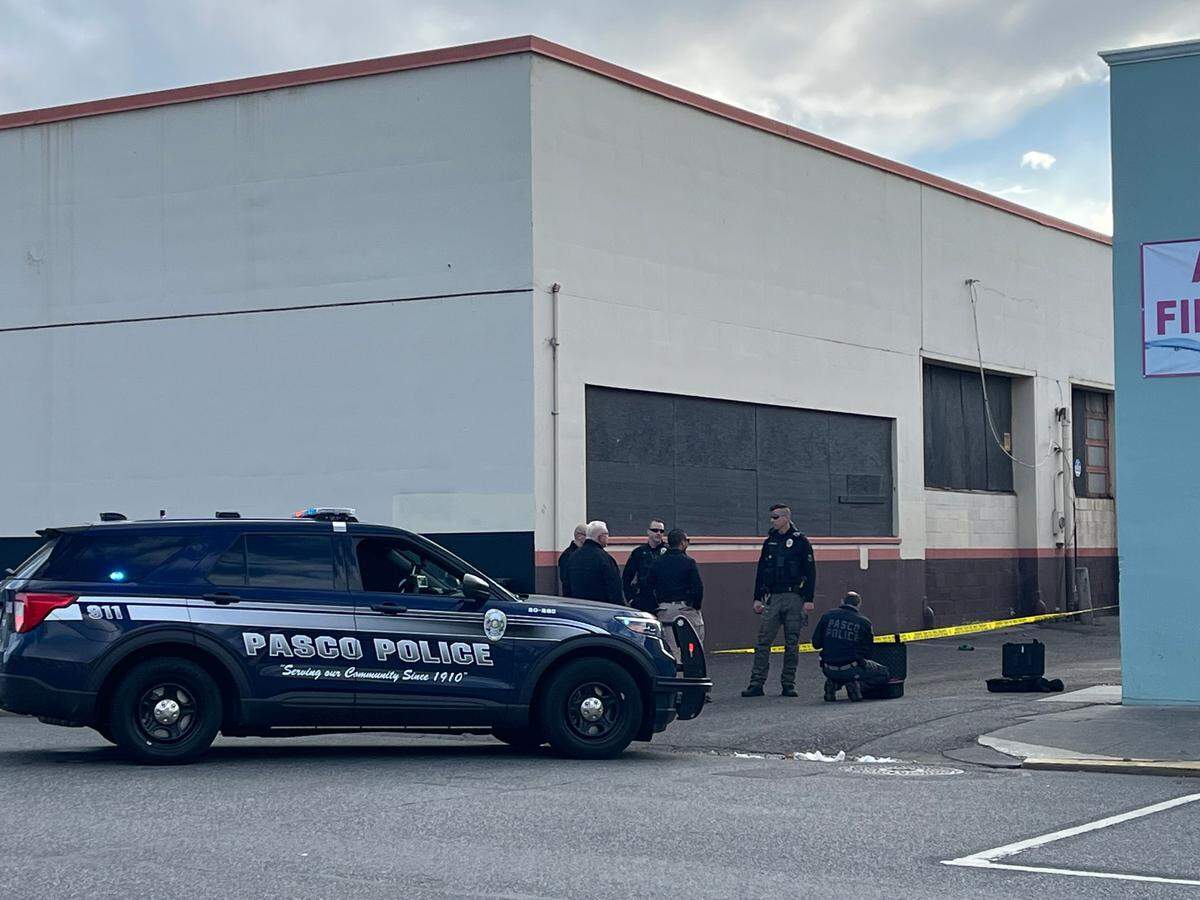 Pasco police say a person was shot and wounded in an alley on Tuesday in the downtown area.