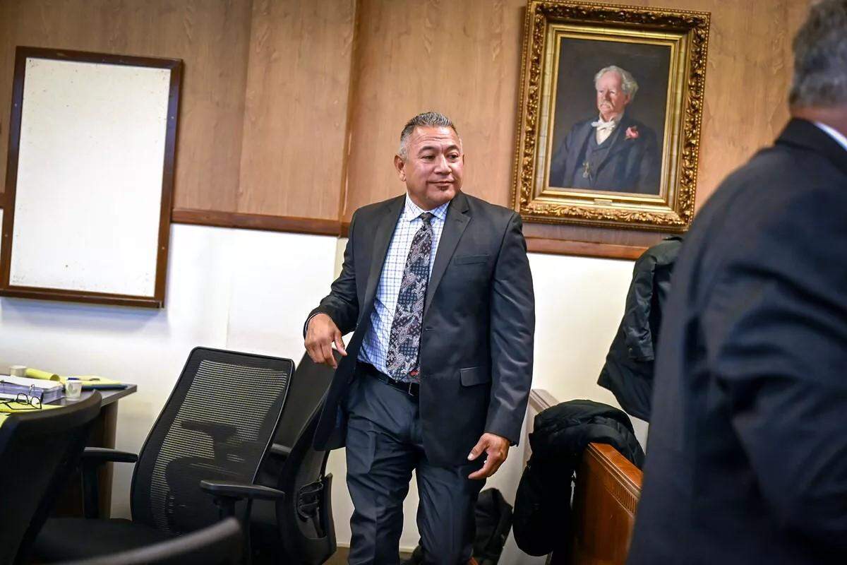 Former Pasco Officer Richard Aguirre leaves court during a break in his second trial in 2023 in the Spokane County Courthouse. 