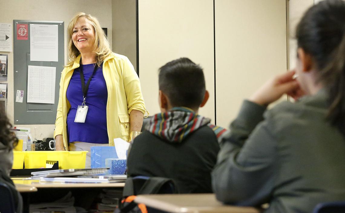 Dawn Johnson, a teacher at Rowena Chess Elementary, works with her sixth-grade students recently at the Pasco school. The popular teacher is scheduled for kidney transplant surgery this summer.