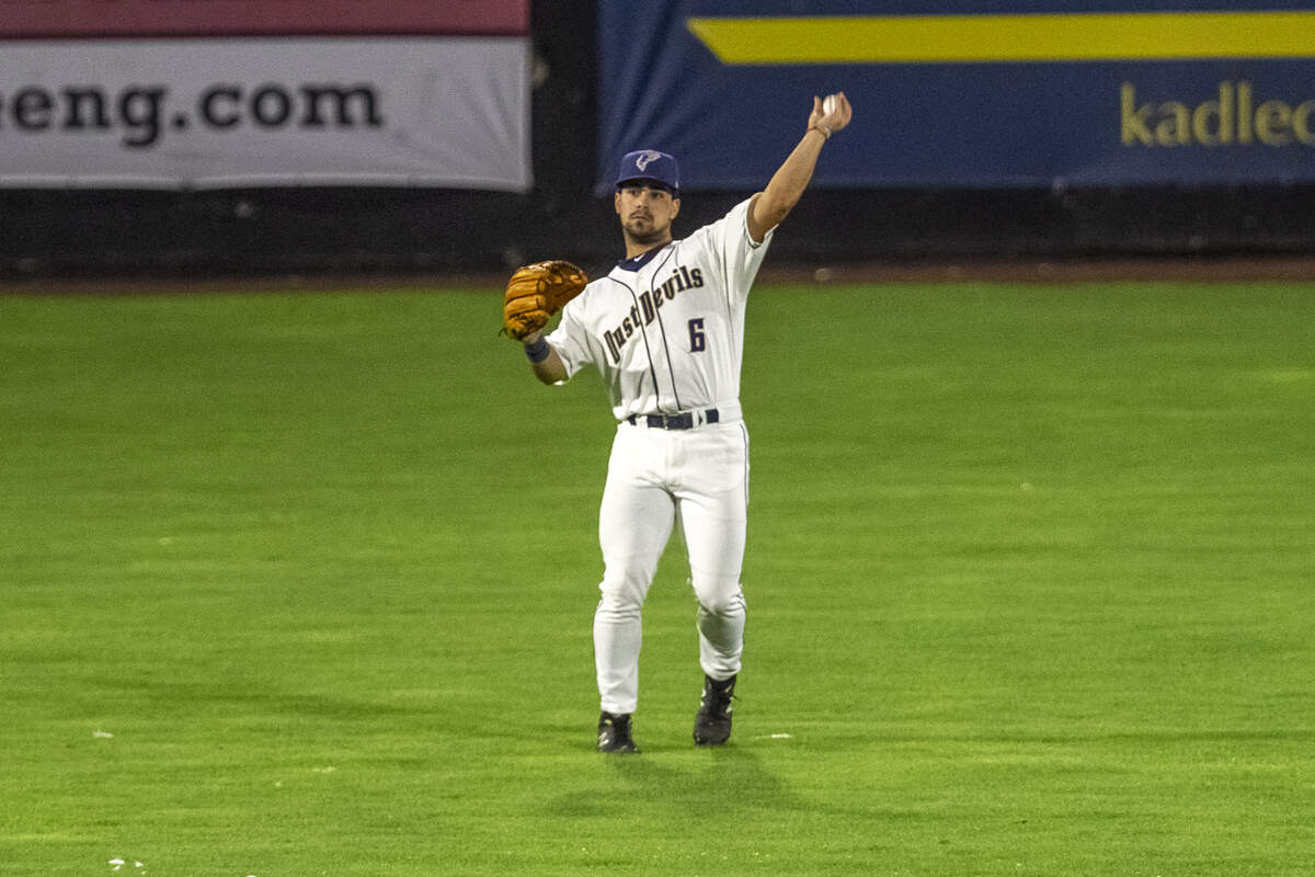 Tri-City Dust Devils outfielder Matthew Acosta (6) throws the ball during Game 4 of the Northwest League playoff finals against the Hillsboro Hops at Gesa Stadium on Tuesday. The Dust Devil defeated the Hops 6-0.