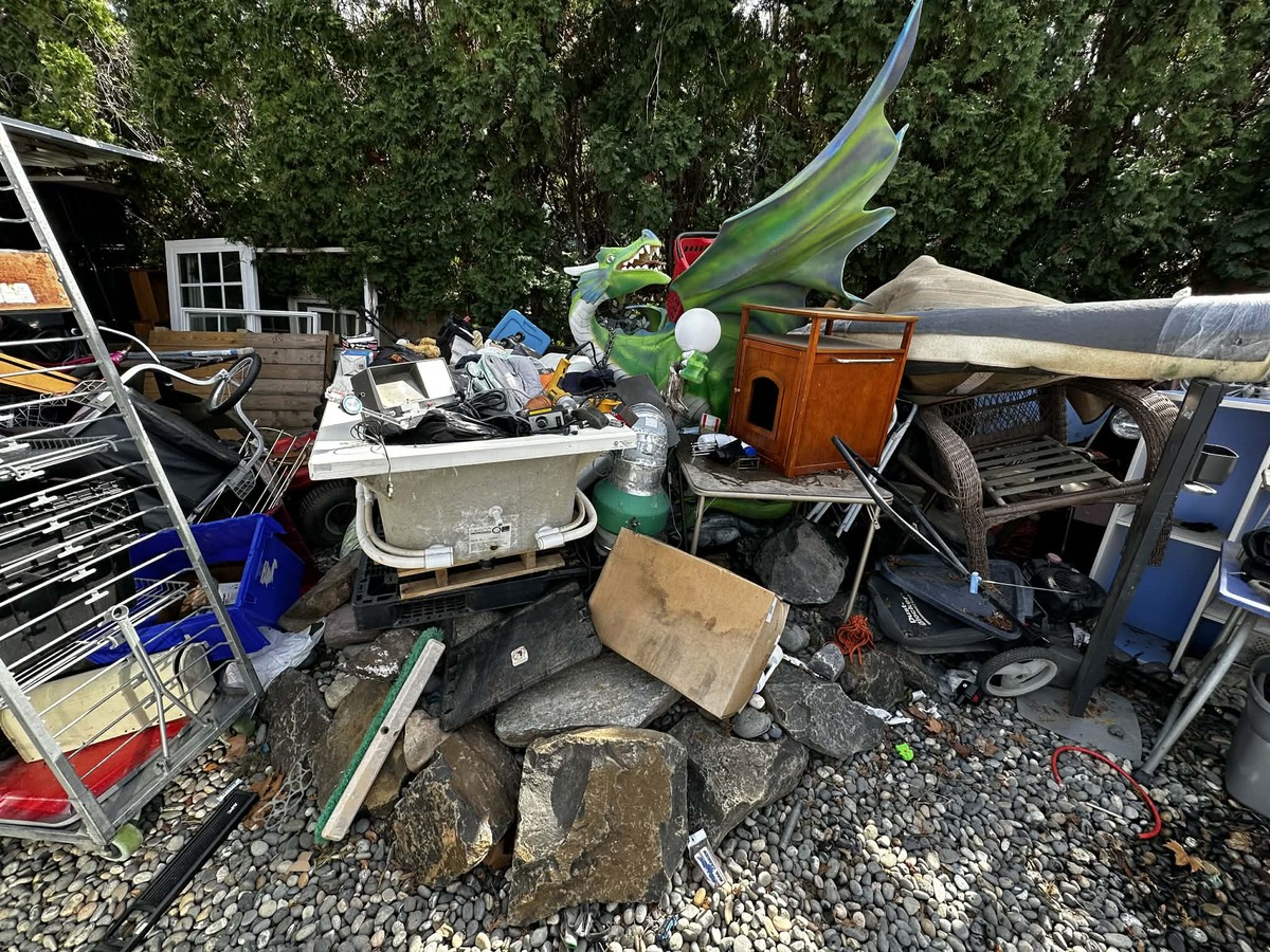 The missing dragon was discovered the middle of piles of junk at a Hains Avenue yard.