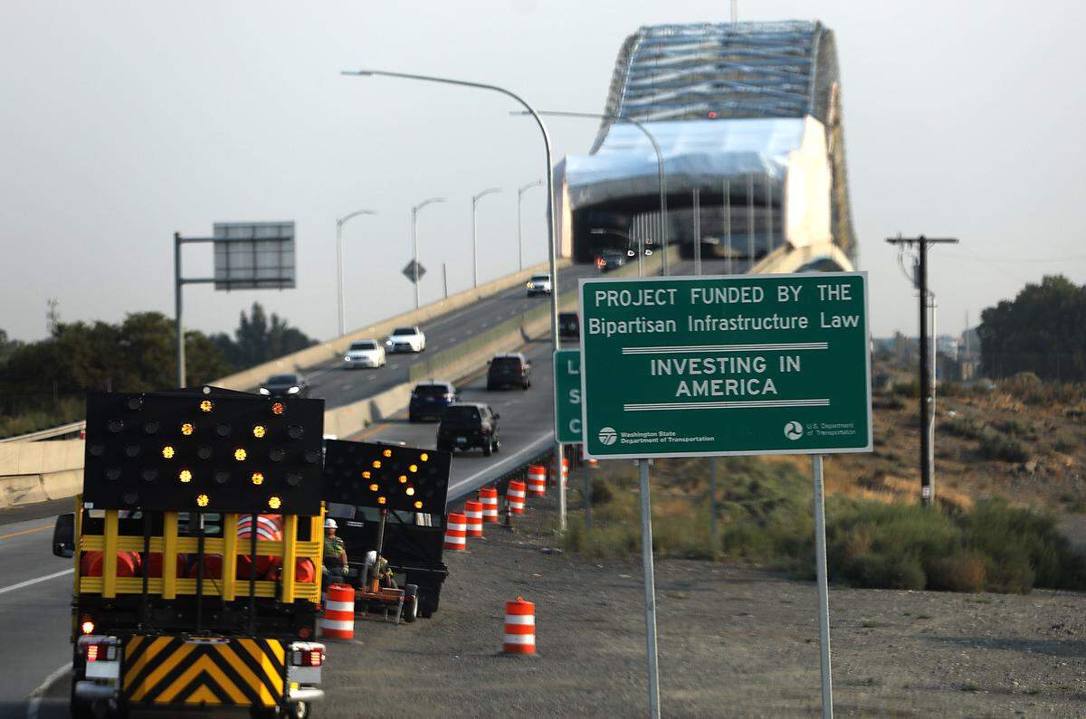 A “cocoon” of tarps cover the south side of the blue bridge during a year-long, $33.5 million paint and repair project. They are being used to prevent debris falling into the Columbia River or onto passing vehicles.