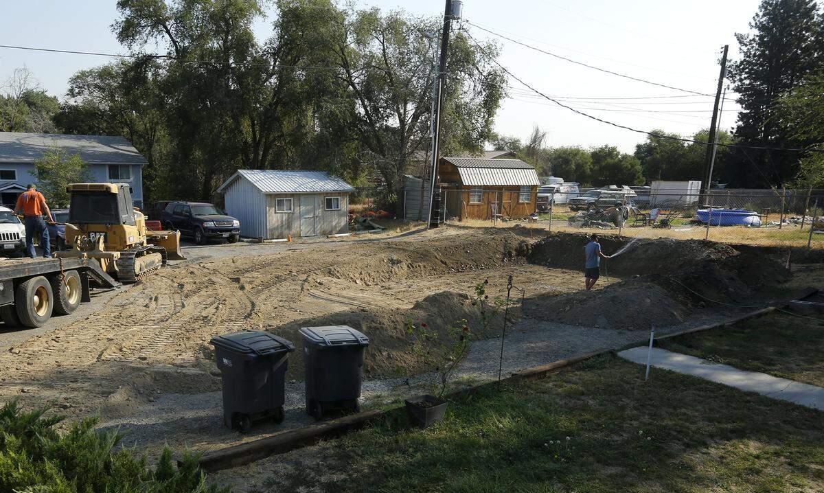 A site in the 3400 block of West Seventh Avenue in Kennewick is being prepared for the relocation of a prefabricated house that’s part of retired teacher Steve Buckingham’s $2 million townhome project.