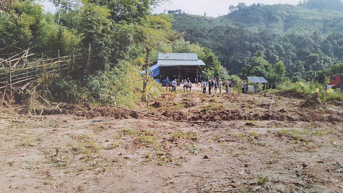 The second site to be searched in Vietnam for missing Air Force Maj. San D. Francisco is shown with a trench already dug. There was an urgency to search the site as soon as possible because the landowner had recently constructed a building there.