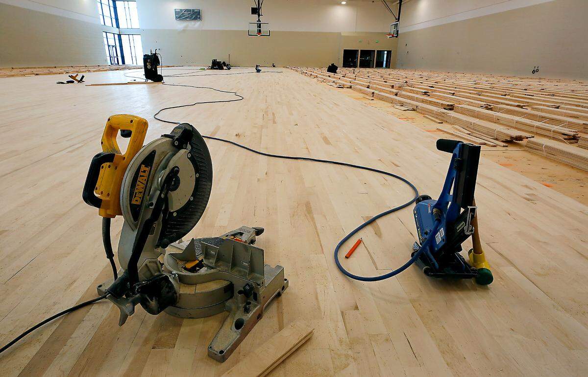 Thousands of wooden floor boards are being installed in Sageview’s main gymnasium.