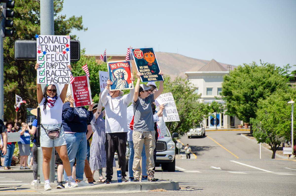 Thousands gathered Saturday, June 14, along Columbia Center Boulevard in Kennewick, Washington, for the nationwide “No Kings” protest. They demonstrated against President Donald Trump’s policies and against arrests made in the Hispanic community by U.S. Immigration and Customs Enforcement, or ICE.