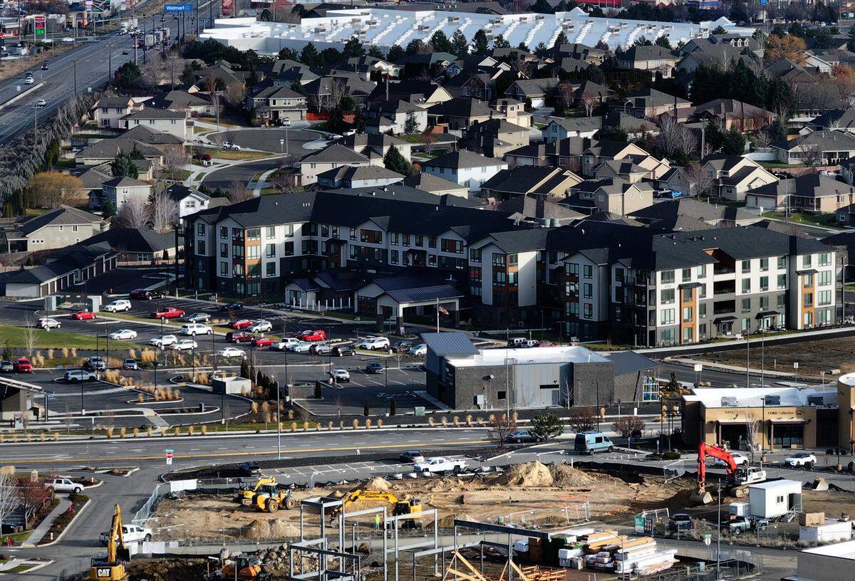 Excavators prepare the site for the new 4,600-square-foot Idaho Central Credit Union branch in south Kennewick.