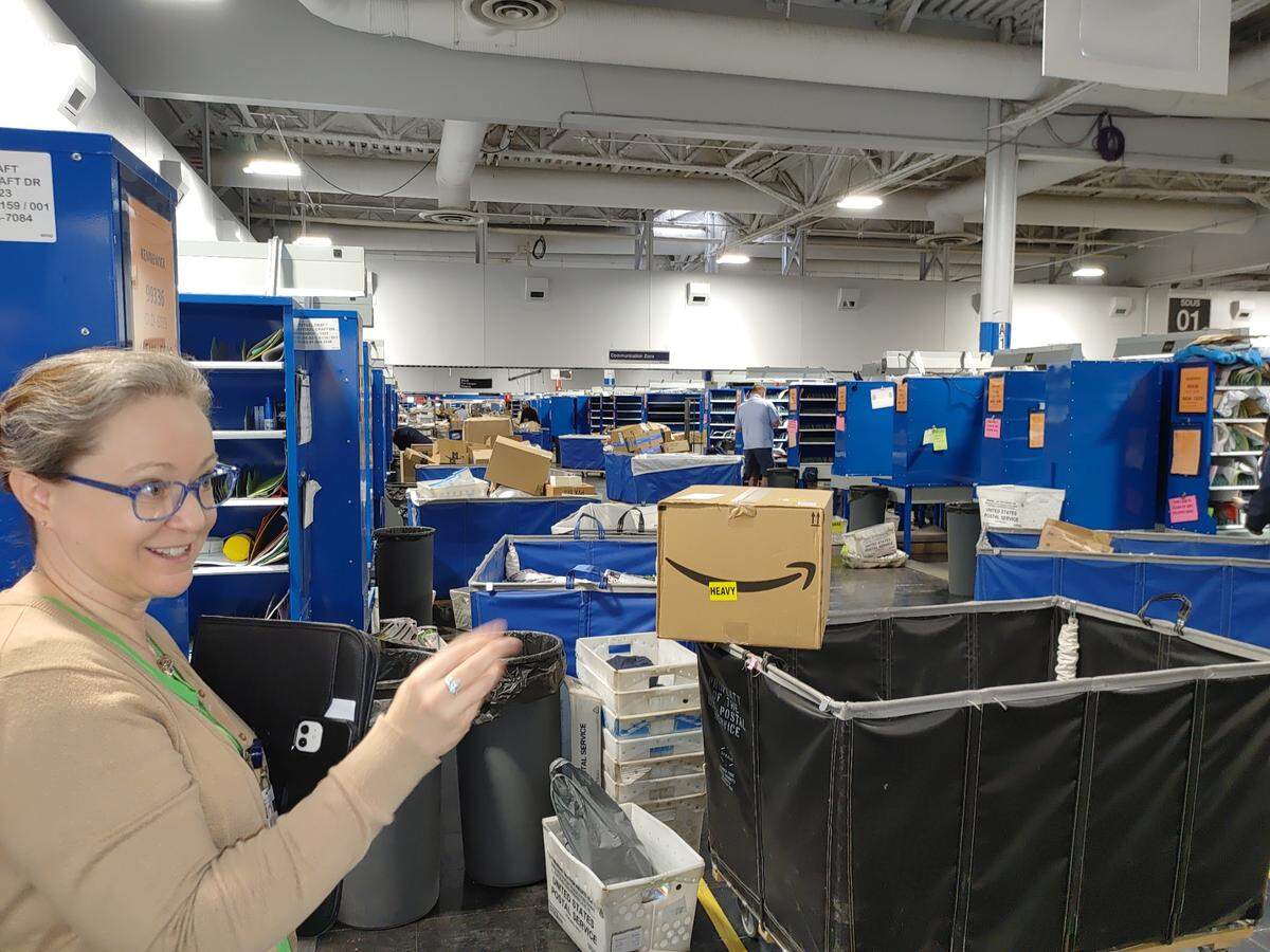 Kim Frum, strategic communications specialist for the U.S. Postal Service, explains how a high-tech modernization of the Pasco Post Office transformed it into a sorting and delivery station.