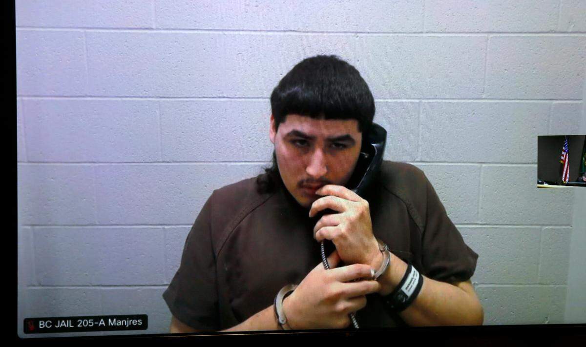 Felipe Manjares, 19, who is one of two people accused of killing Michael Castoreno, 21, at a Richland apartment complex, appears in 2023 via a video link in Benton County Superior Court.