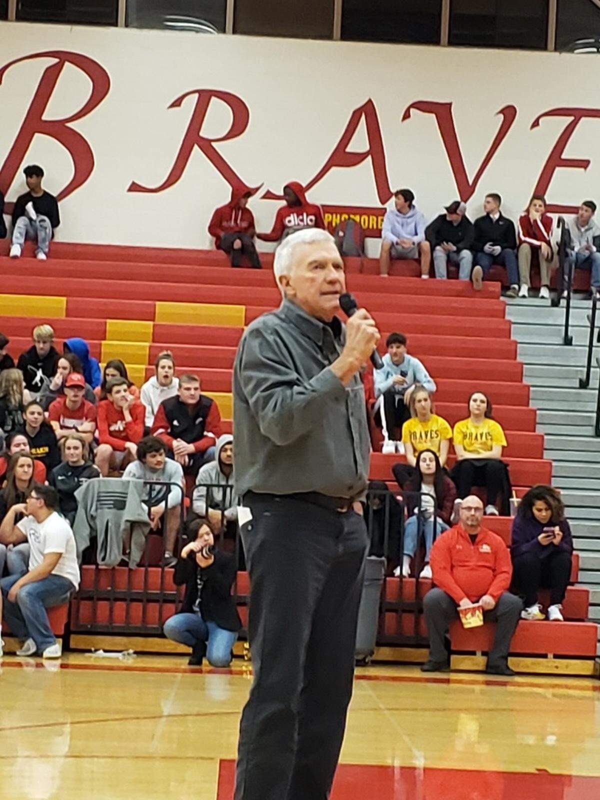 Randy Dolven spoke to the crowd at halftime of a Kamiakin boys basketball game in early January. Dolven was part of a Kamiakin basketball reunion that night.