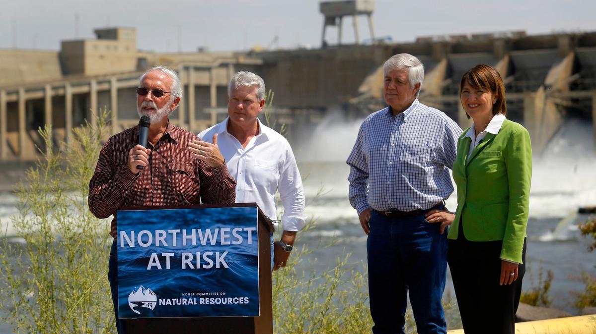 Congressman Dan Newhouse R-Wash., stands near Ice Harbor Dam with colleagues Mike Collins, R-Georgia., Cliff Bentz R-Ore.. and Cathy McMorris-Rodgers R-Wash., after touring the Snake River dam before a community field hearing about the dams in Richland.