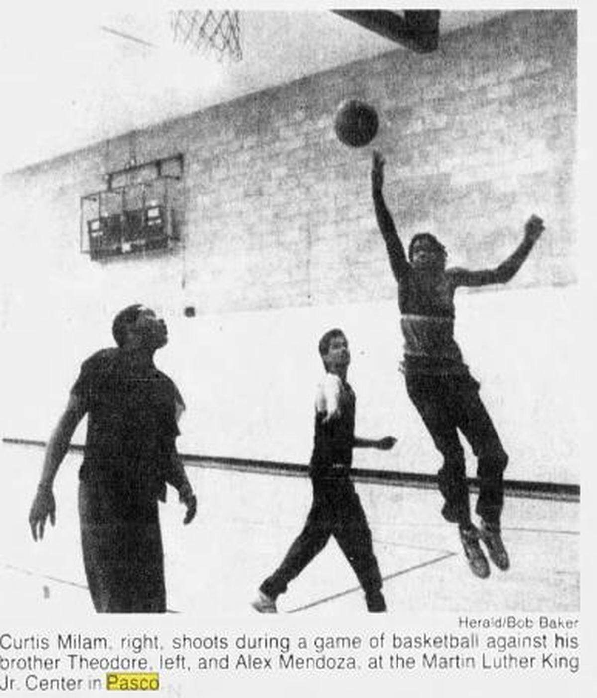 An archive photo from 1989 shows young athletes playing a game of basketball at the MLK Center.