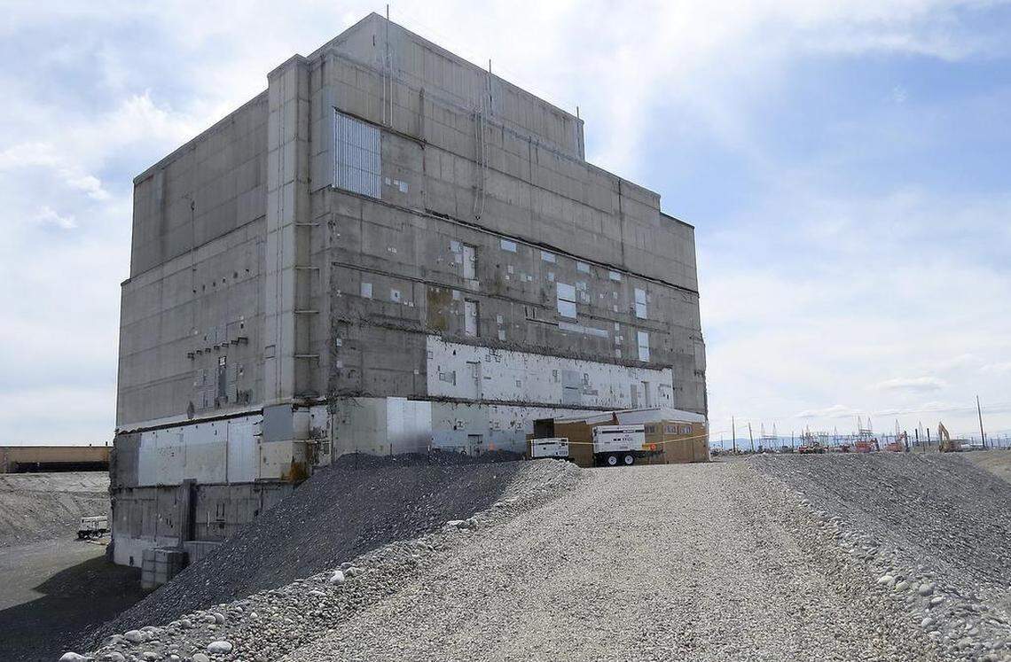 Hanford’s K East Reactor will be covered with a temporary enclosure to put it in storage while radiation decays to more manageable levels over 75 years.