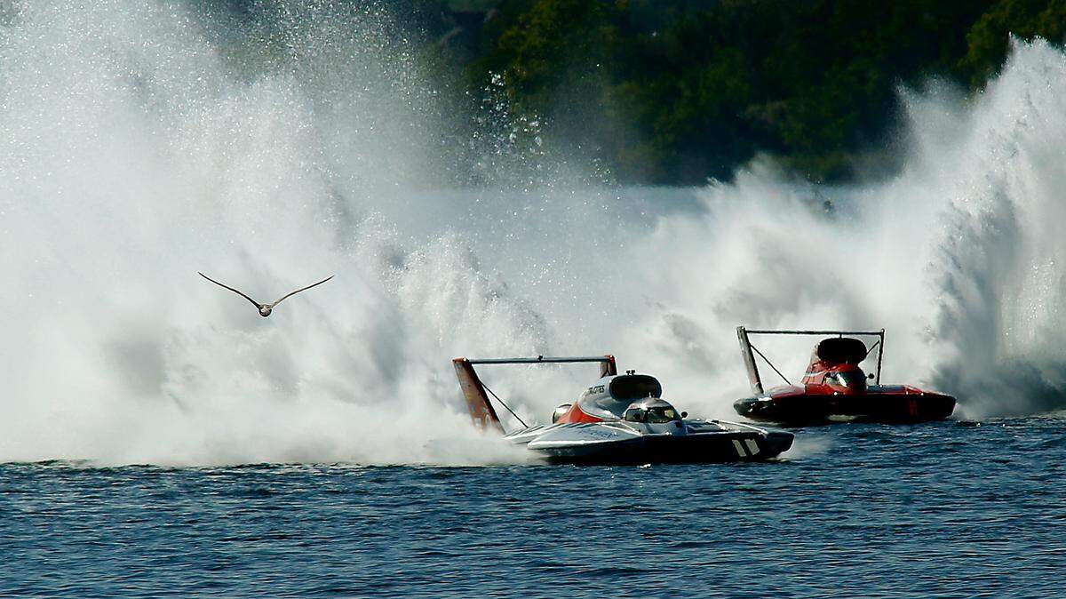A gull flies over the Columbia River as J. Michael Kelly in the U-8 Miss Tri-Cities unlimited hydroplane races to victory in front of Andrew Tate in the U-12 Graham Trucking in Heat 2A of Columbia Cup racing action Saturday on the Columbia River.