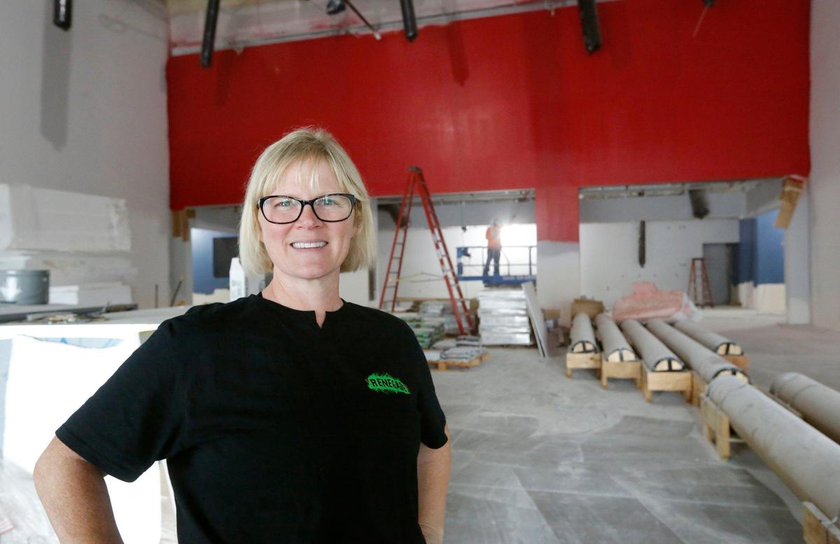Manager Mamie Gale stands in the freshly painted lobby Monday of the new 10-screen Fairchild Cinemas at Southgate movie theater near Walmart. The finishing touches are still underway for the new building at 2823 S. Quillan St. in Kennewick. Watch a video at: tricityherald.com/video
