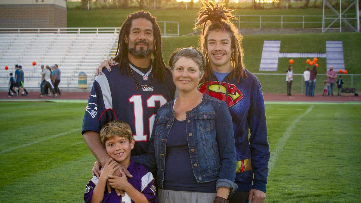 The Slack family stand inside Fran Rish Stadium in Richland on Wednesday participating in the third annual Strides to End Teen Suicide walk held by Hanford and Richland high schools. From the bottom left,  Anderson, 6, Leo Slack, Tiffany Slack, center and Darian Slack.
