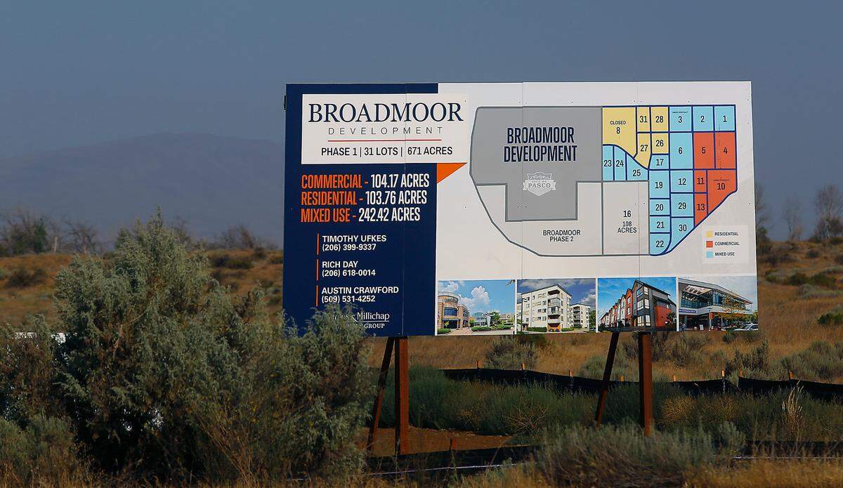 A sign posted along Broadmoor Boulevard outlines the Broadmoor Development plans for the land in west Pasco. After months of planning and looking at various properties, the Pasco Public Facilities District has settled on the Broadmoor area because of the potential it brings for growth centered around the new aquatic facility.